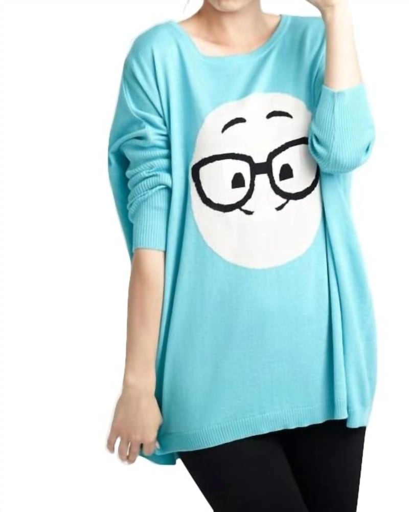 Front of a model wearing a size LG Geek Chic Emoji Pullover in Turquoise in Turquoise by ANGEL. | dia_product_style_image_id:327641